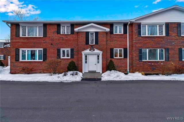 view of front of property featuring brick siding