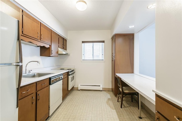 kitchen featuring sink, fridge, a baseboard heating unit, range, and white dishwasher