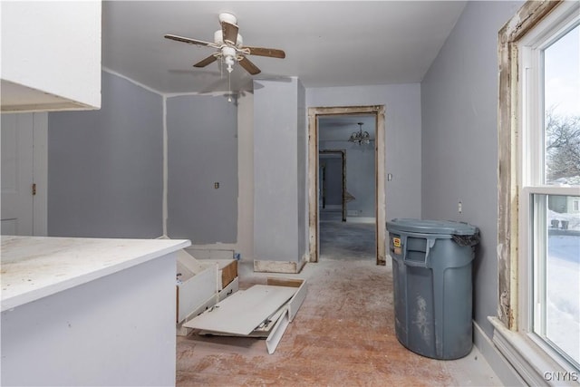 interior space with ceiling fan and a healthy amount of sunlight