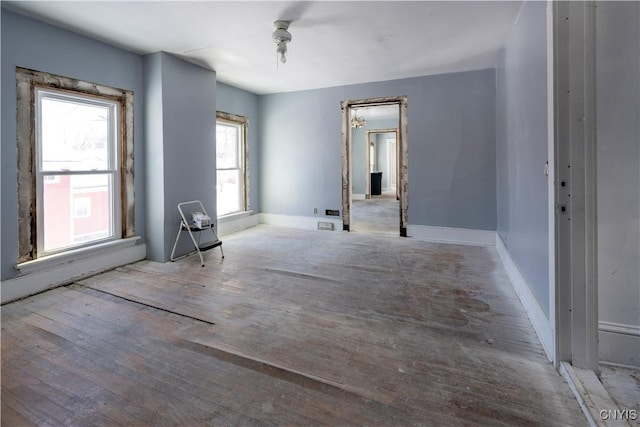 unfurnished room with light hardwood / wood-style floors