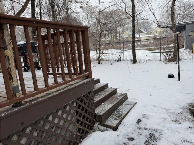 view of yard layered in snow