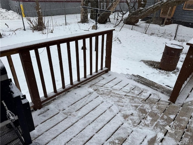 view of snow covered deck