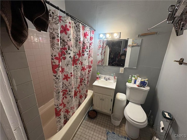 bathroom with tile patterned floors, vanity, and toilet