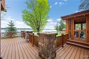 wooden deck with a water view