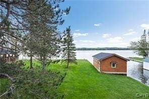 view of yard with a water view