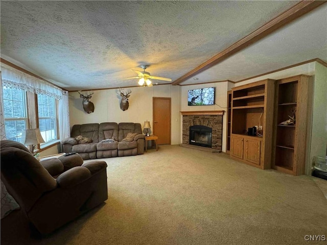 living room featuring a fireplace, carpet flooring, ceiling fan, crown molding, and a textured ceiling