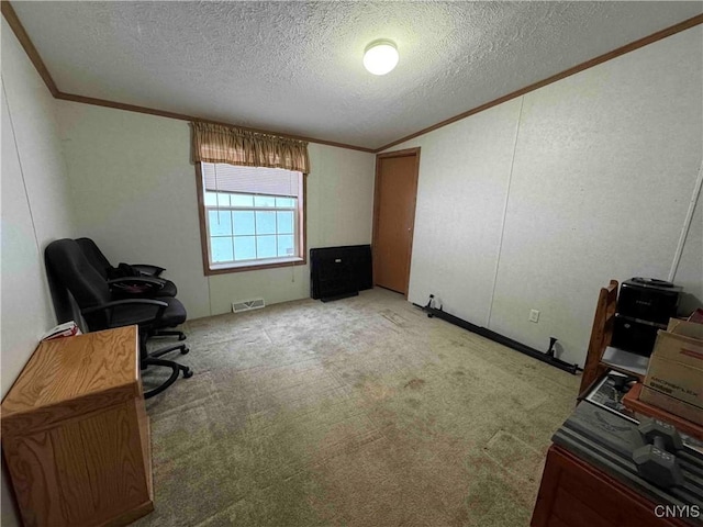 home office featuring crown molding, light carpet, and a textured ceiling