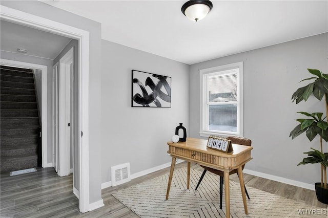 office area with hardwood / wood-style floors