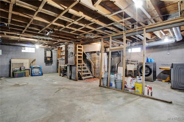 basement featuring independent washer and dryer