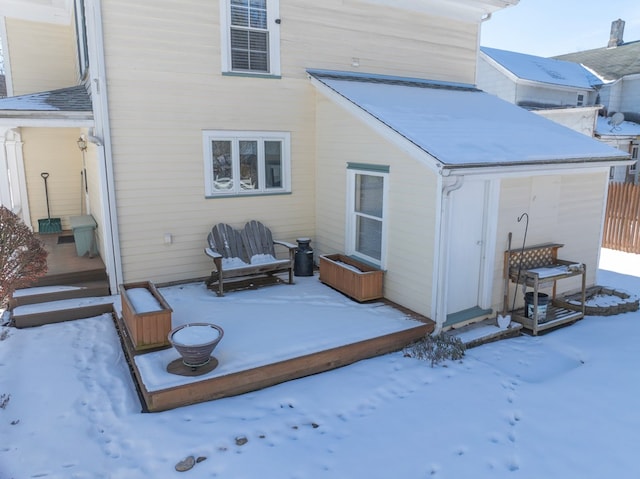 view of snow covered house