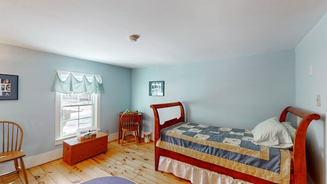 bedroom featuring wood-type flooring