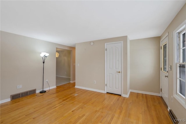 empty room featuring light hardwood / wood-style floors