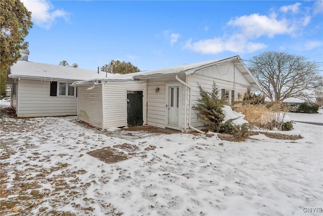 view of snow covered property