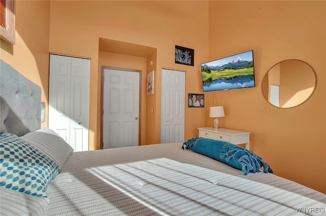 bedroom with a high ceiling