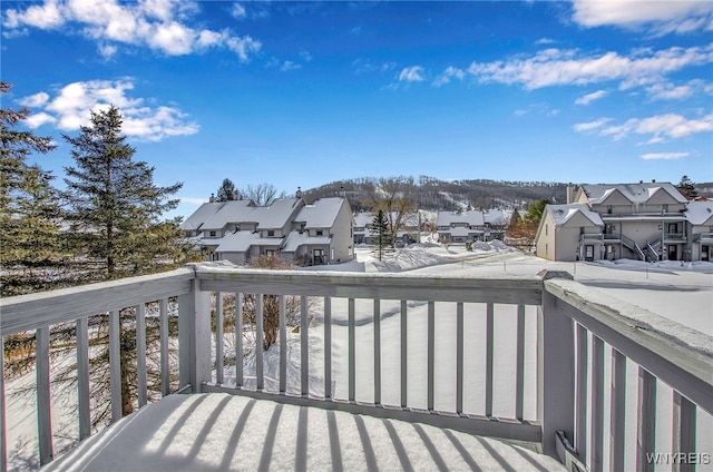 view of snow covered deck