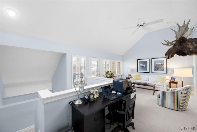 home office with ceiling fan, carpet flooring, and high vaulted ceiling