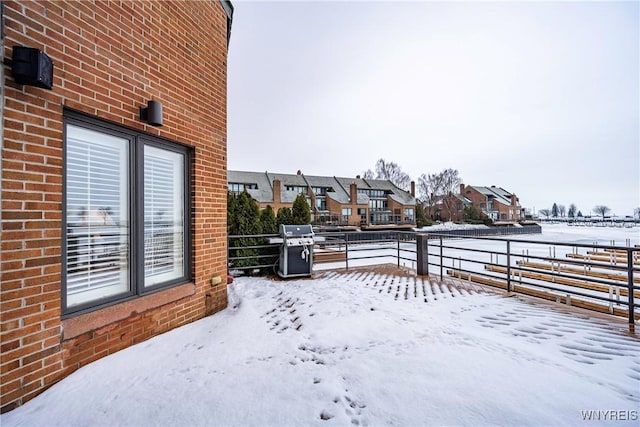 view of yard covered in snow