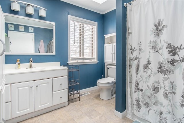 bathroom featuring vanity, a shower with curtain, ornamental molding, and toilet