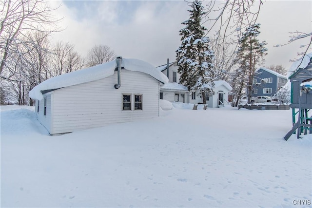 view of snow covered property