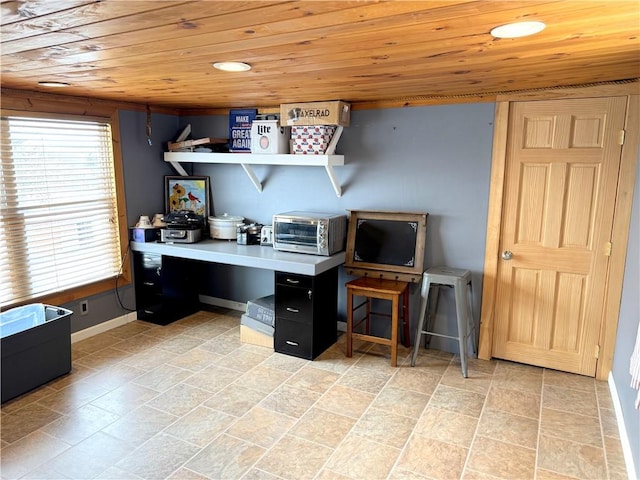 home office featuring built in desk and wooden ceiling