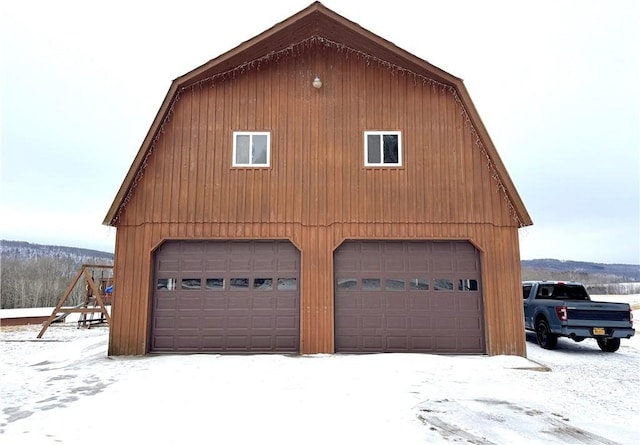 view of snow covered garage