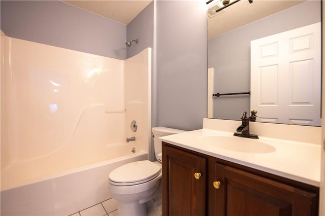 full bathroom with tile patterned floors, toilet, tub / shower combination, and vanity