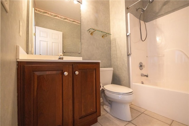 full bathroom featuring vanity, tile patterned floors, bathing tub / shower combination, and toilet