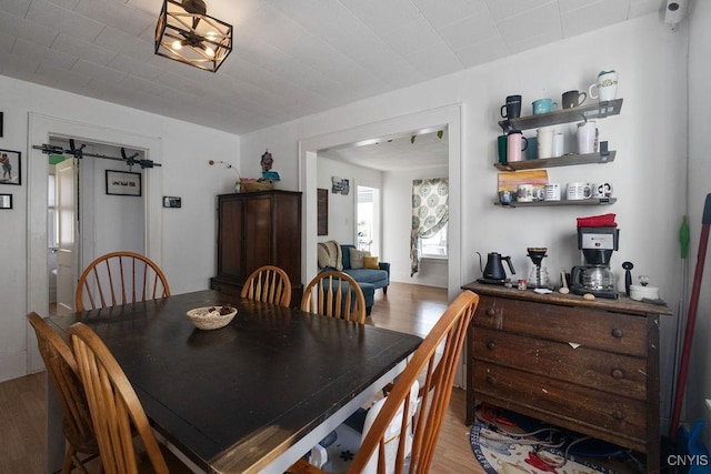 dining area featuring hardwood / wood-style floors