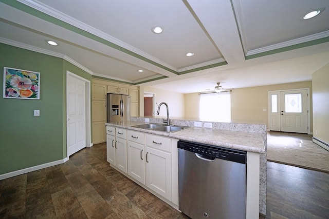 kitchen with sink, crown molding, dark wood-type flooring, stainless steel appliances, and white cabinets