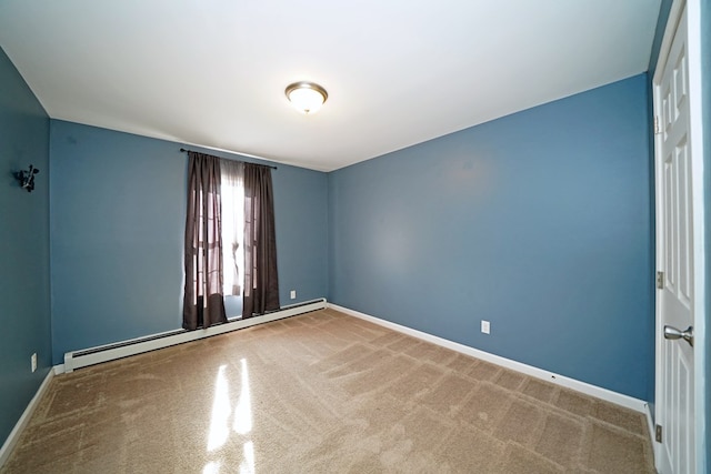 unfurnished room with baseboard heating and carpet flooring