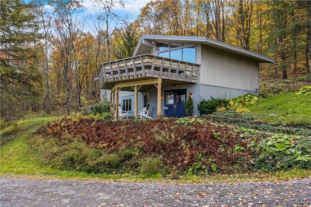 view of front of house with a deck