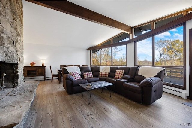 living room featuring hardwood / wood-style flooring, a baseboard heating unit, vaulted ceiling with beams, and a fireplace