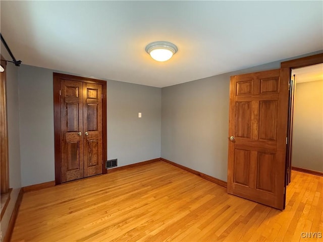 555 County Route 51, New Haven, NY 13114 - spare room featuring light wood-type flooring and baseboards