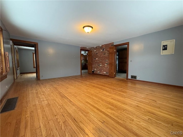 empty room featuring light hardwood / wood-style floors