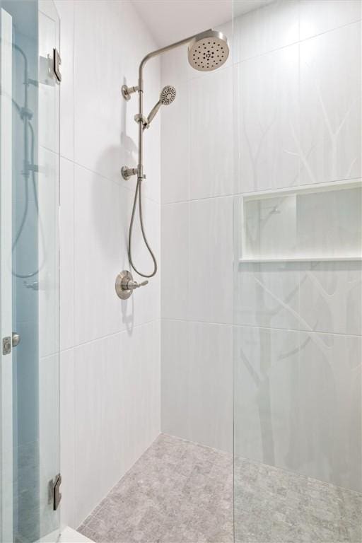 bathroom featuring an enclosed shower