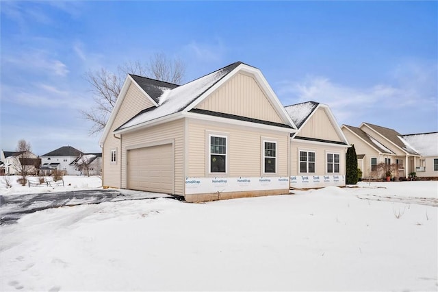 exterior space featuring board and batten siding and an attached garage