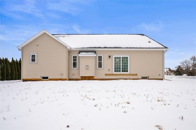 view of snow covered house