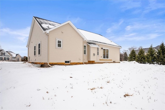 view of snow covered property