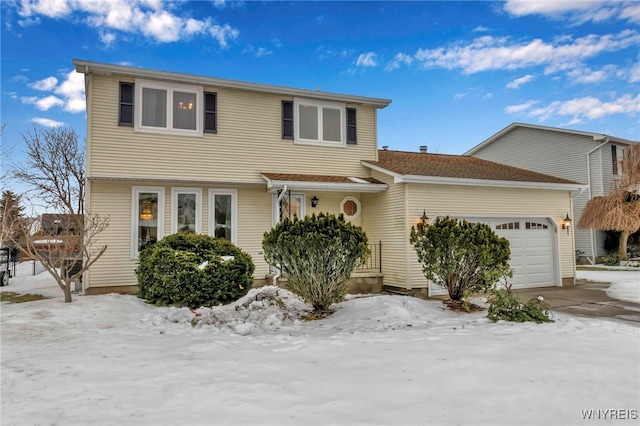 front of property with a garage