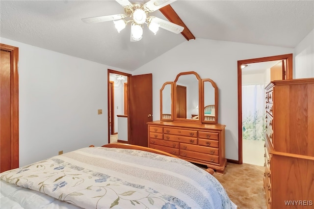 bedroom featuring vaulted ceiling with beams, a textured ceiling, and ceiling fan