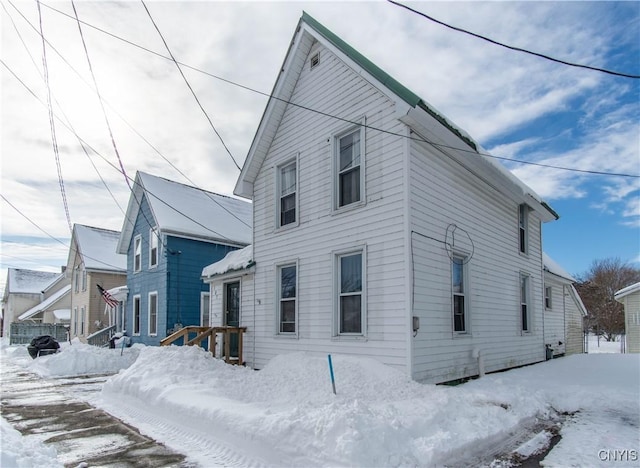 view of snow covered property