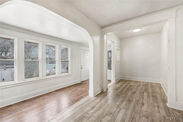 empty room featuring hardwood / wood-style flooring