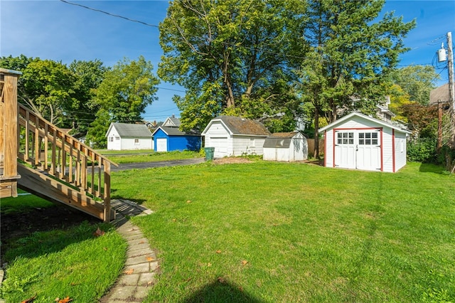 view of yard with a storage shed