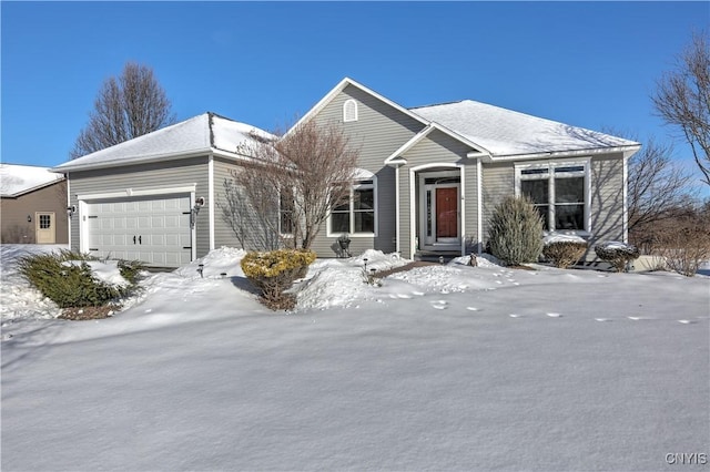 view of front of property featuring a garage