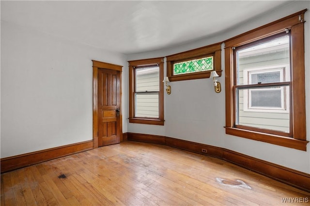 spare room with light hardwood / wood-style floors