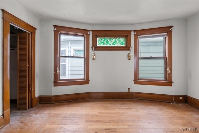 spare room with light wood-type flooring