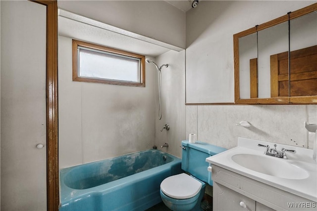 full bathroom with washtub / shower combination, vanity, and toilet