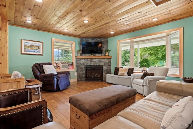 living room with hardwood / wood-style flooring, a fireplace, and wood ceiling