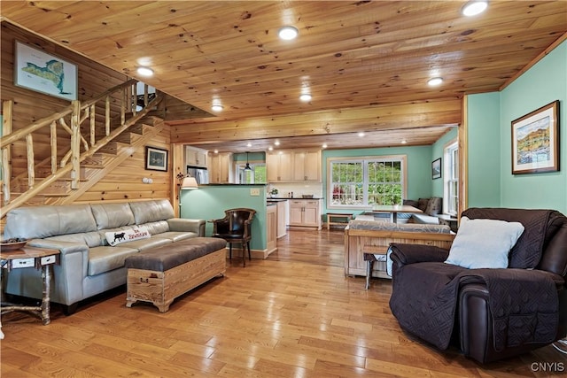 living room with wooden ceiling and light wood-type flooring