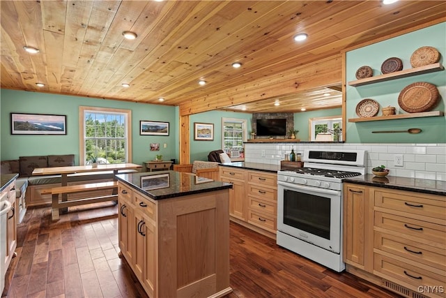 kitchen with a center island, dark wood-type flooring, wooden ceiling, and white gas range oven